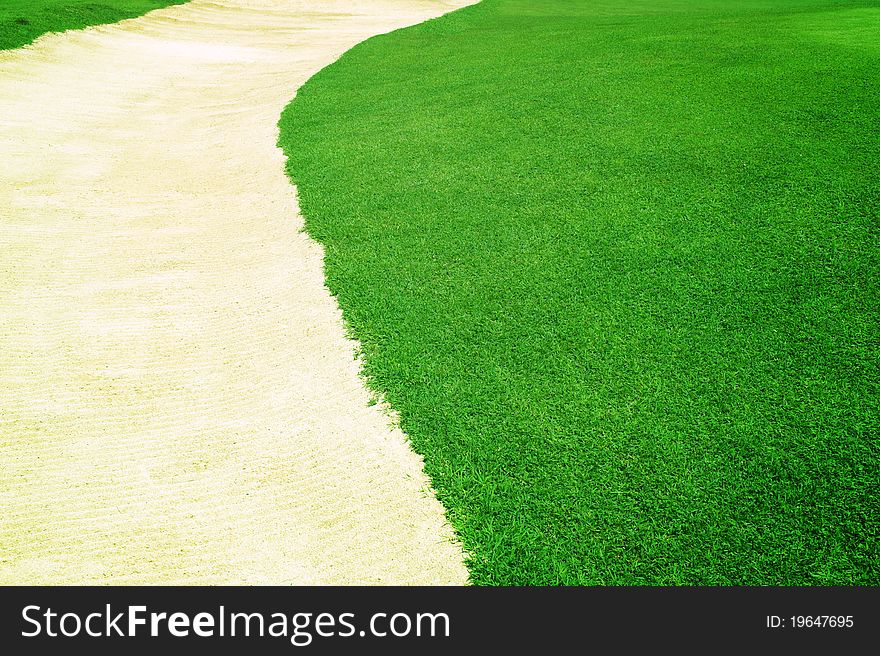 A green grass curve sand