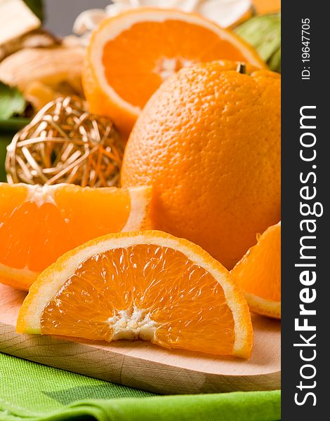 Photo of delicious orange on cutting board. Photo of delicious orange on cutting board