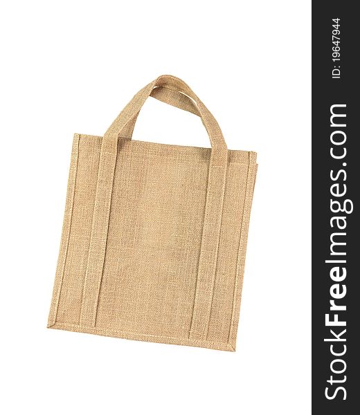 A recycle shopping bagisolated against a white background. A recycle shopping bagisolated against a white background