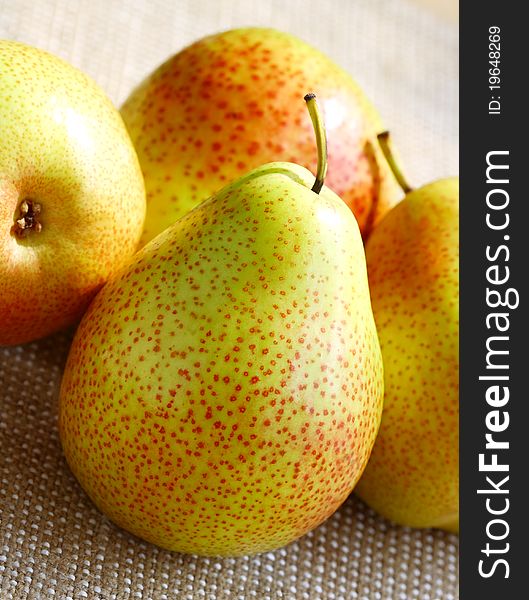 The large beautiful multi-coloured pears close up