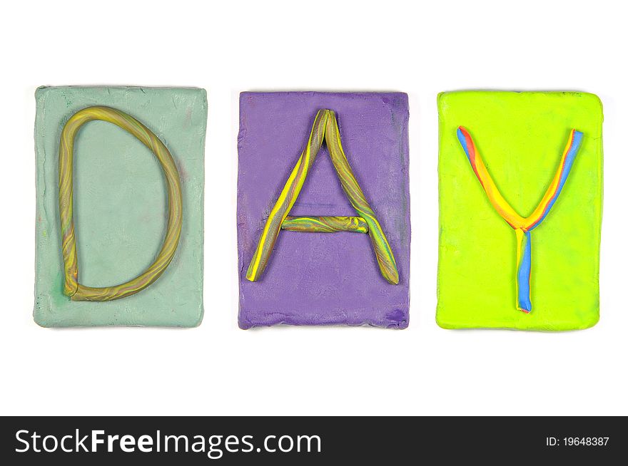 Clay letters. Words DAY isolated on the white background