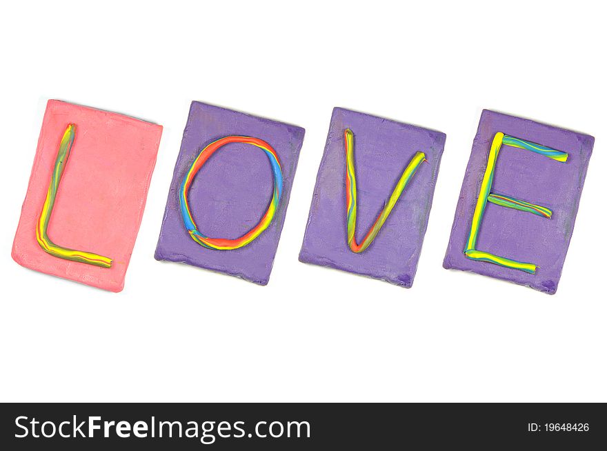 Clay letters. Words LOVE isolated on the white background