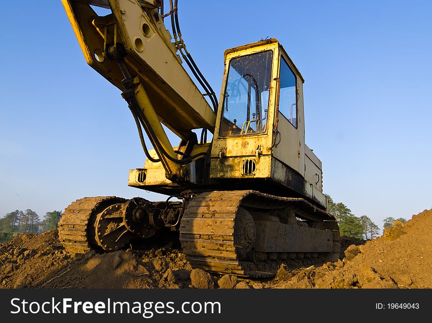 Digger, Heavy Duty construction equipment parked at work site