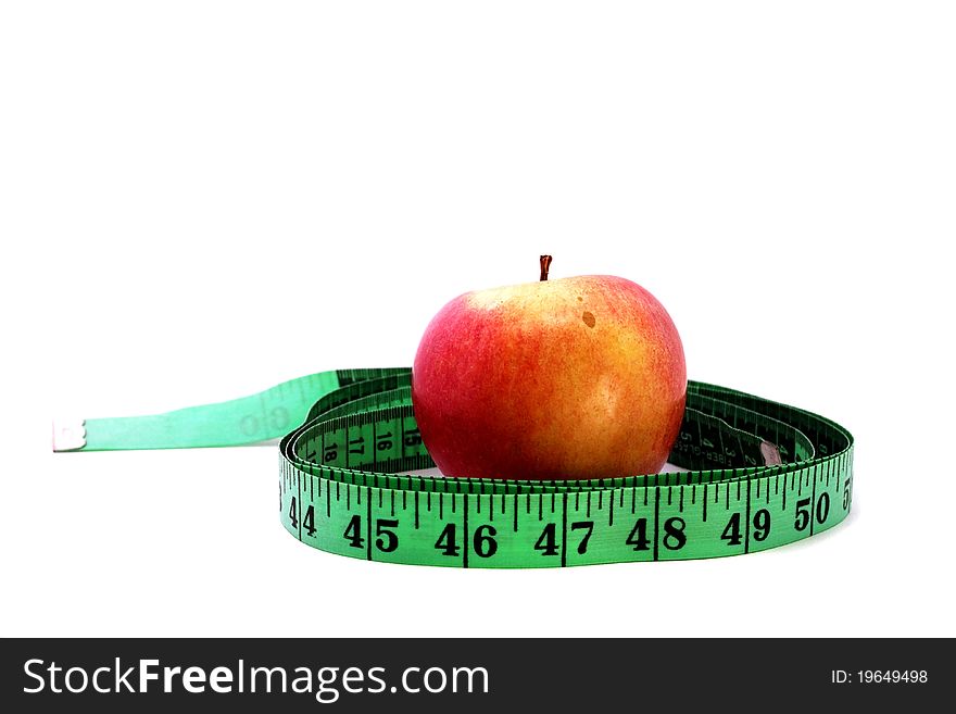 Red apple with measuring tape