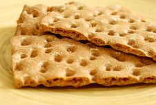 Crackers On Wooden Plate Stock Image