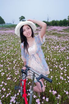 Girl In Garden With Bike Stock Images Girl In Garden With Bike Stock Images