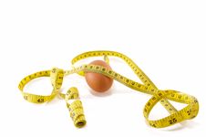 Egg And Measuring Tape Royalty Free Stock Photography