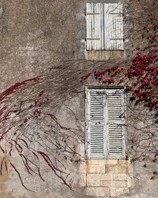 Old Windows With Wooden Shutters On An Old House. Royalty Free Stock Images Old Windows With Wooden Shutters On An Old House. Royalty Free Stock Images