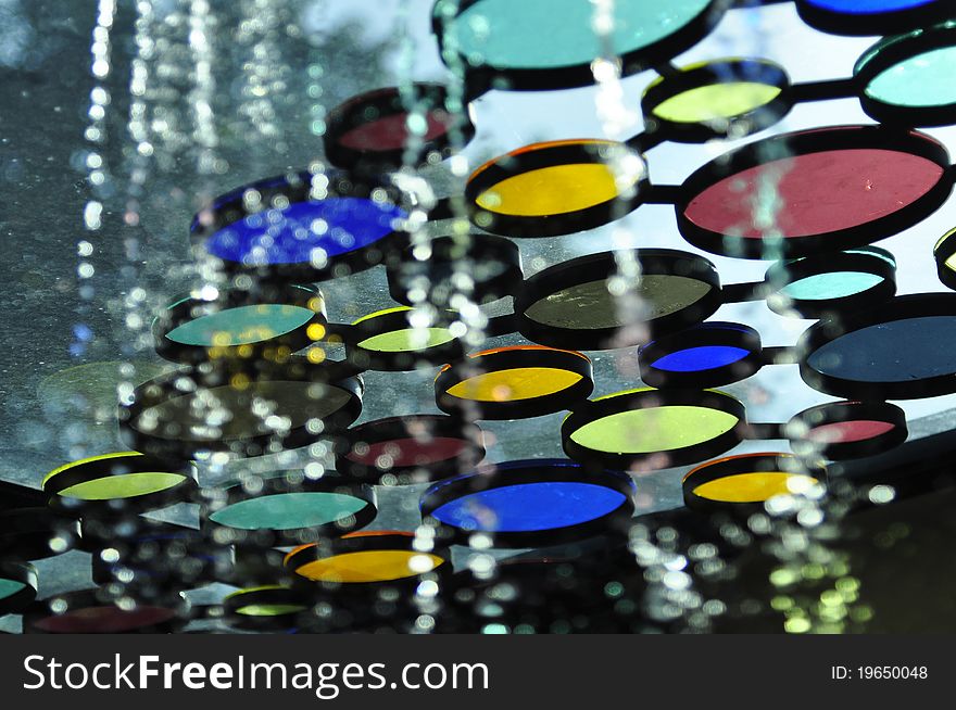 Colorful tinted glass design and water