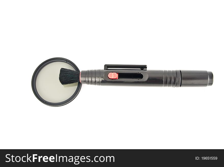 Lens pen for cleaning your lens and filter isolated on white