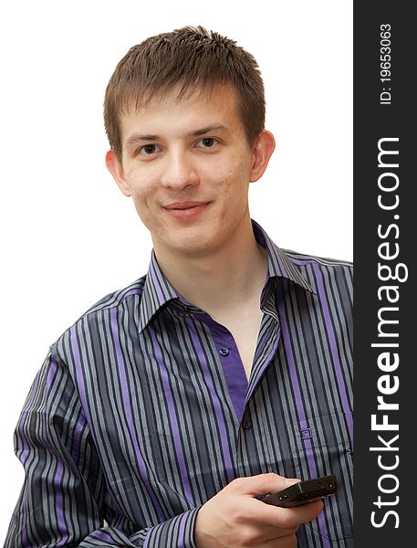 A young man with the phone in a shirt with a white background