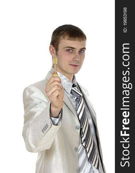 Businessman holding the key to success.