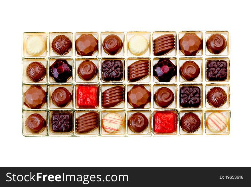 Colorful Chocolates In Box Isolated On White