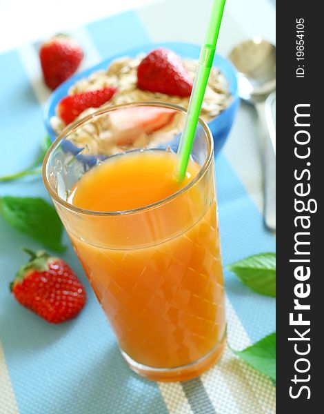 Juice in glass and fresh fruit on table. Juice in glass and fresh fruit on table