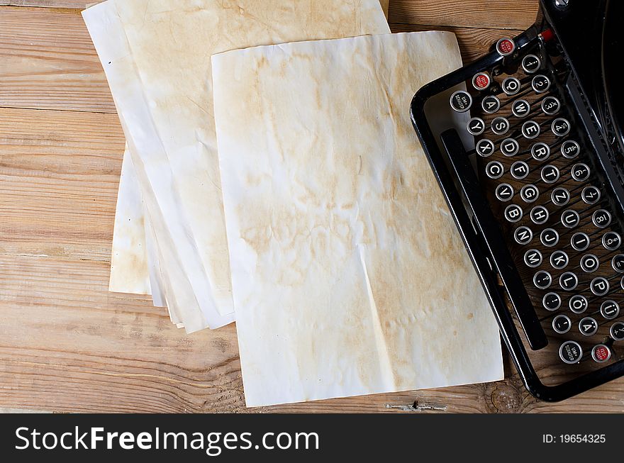 Old paper on a wooden background