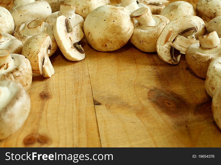 Fresh mushroom on wooden boards
