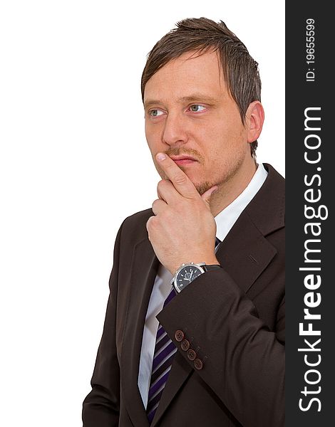 Photo of a businessman with a thoughtful expression. Photo of a businessman with a thoughtful expression