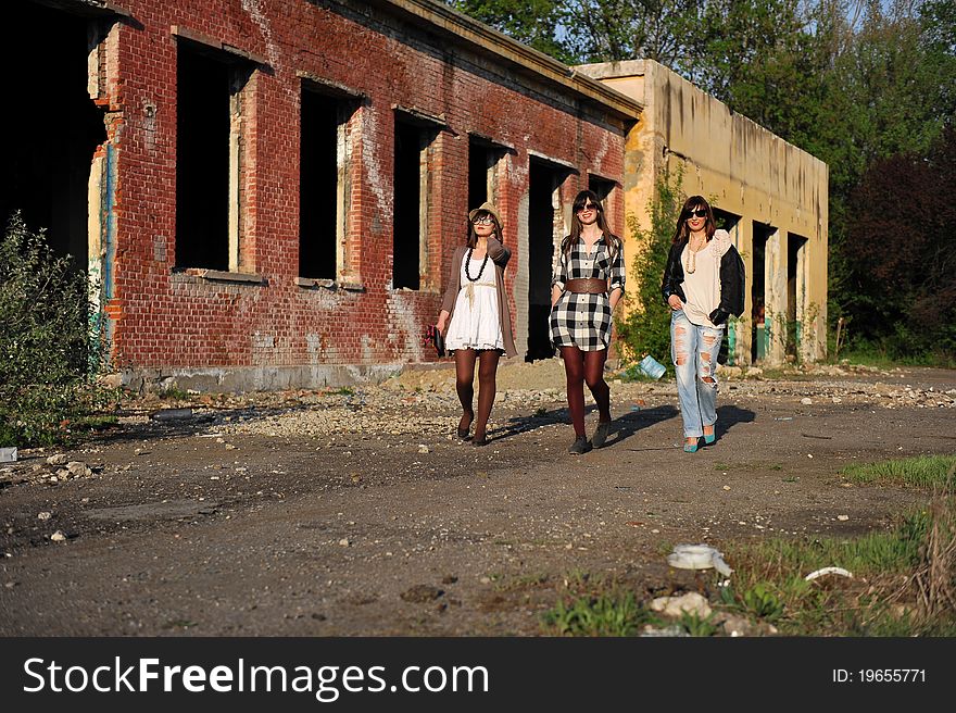 Portrait with beautiful young women walking, stylised vintage