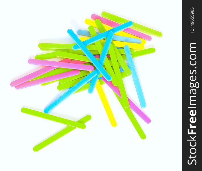 Multi-colored sticks isolated on white