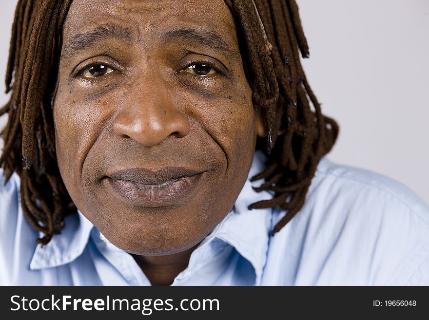 Closeup Portrait of an African American Businessman with Dreadlocks. Closeup Portrait of an African American Businessman with Dreadlocks