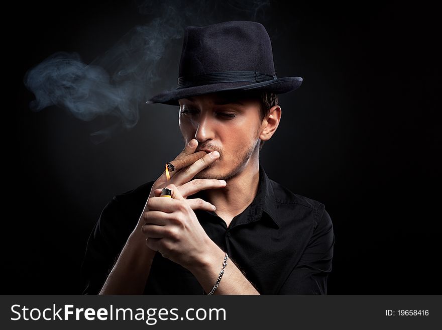 Man With Hat And Cigar In Black & White