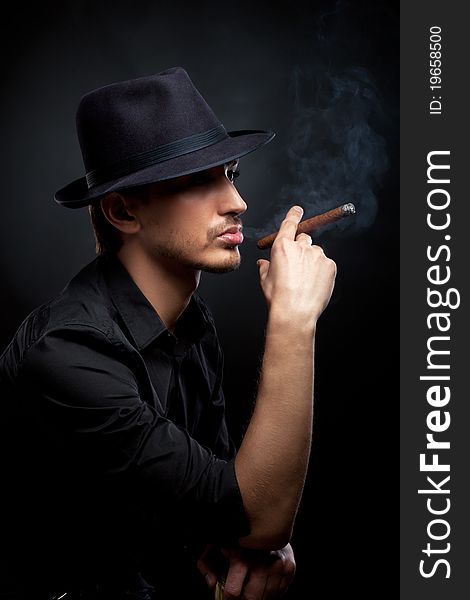 Man With Hat And Cigar In Black & White