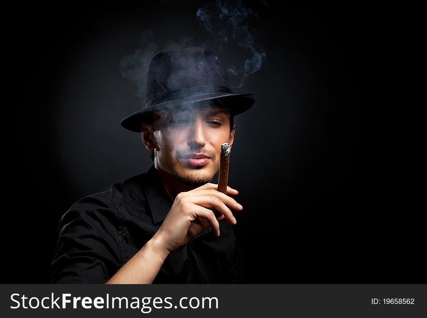 Man With Hat And Cigar In Black & White