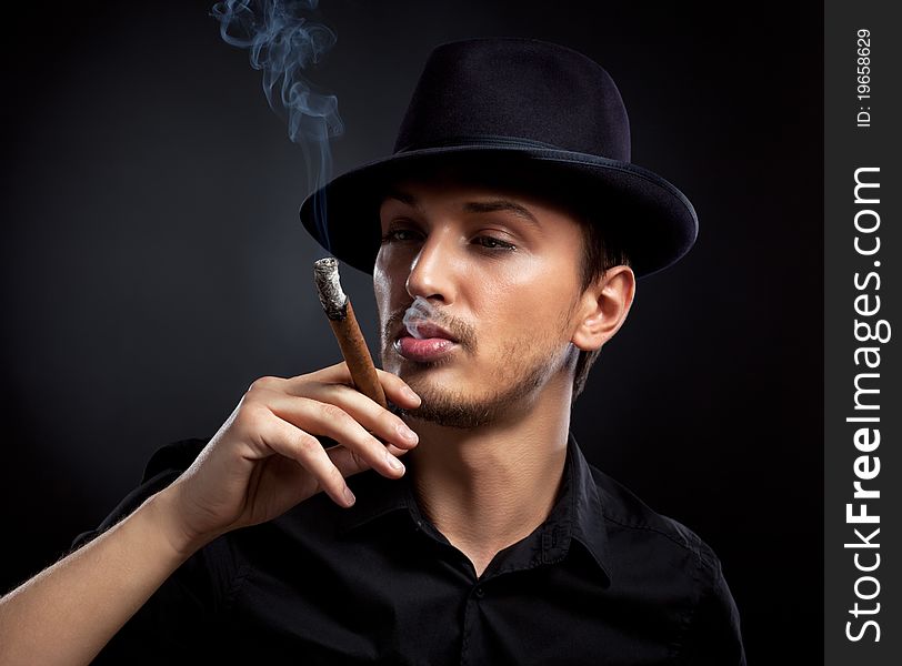 Man with hat and cigar in Black & White