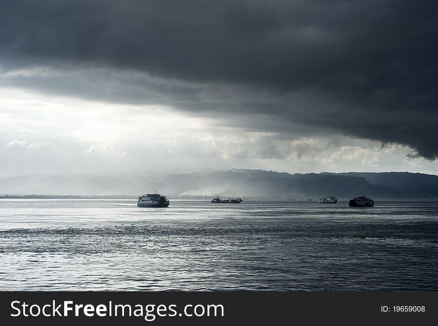 Ferry from Java to Bali under the storm. Indonesia