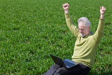 Free Exciting Grandfather With A Laptop Royalty Free Stock Photo - 19661265