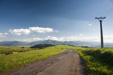 Field Road And Electric Column Royalty Free Stock Photo Field Road And Electric Column Royalty Free Stock Photo