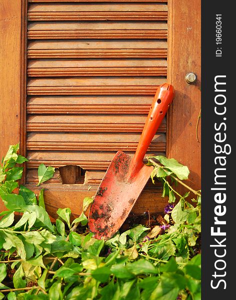 Garden Tools On Wooden Wall