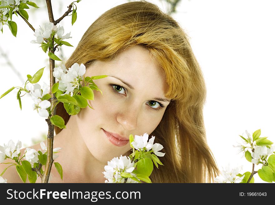 The young beauty woman and an apple-tree. The young beauty woman and an apple-tree