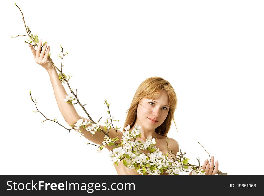 The woman holds over a blossoming branch