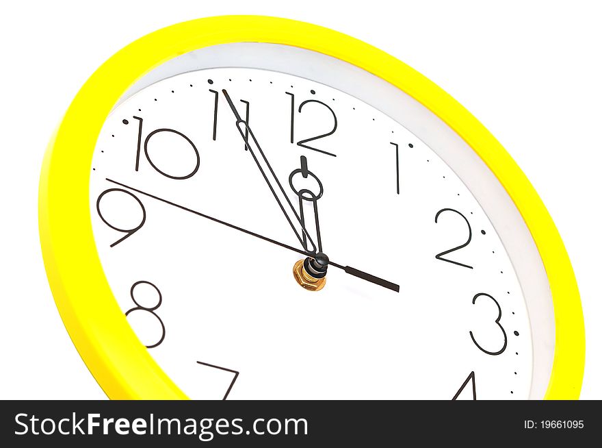 Yellow wall clock on white