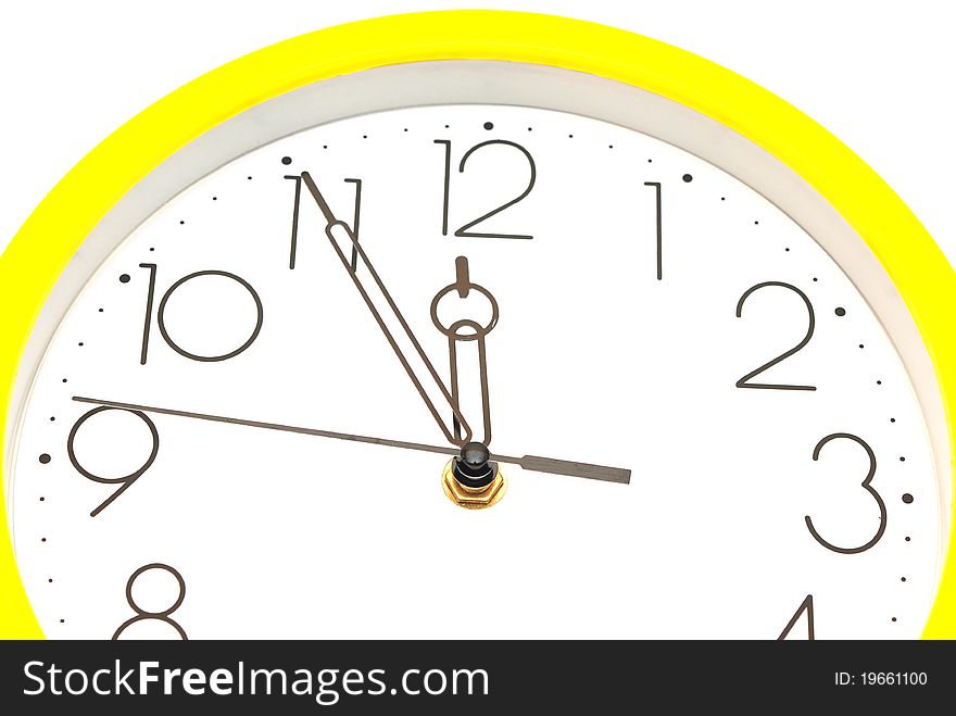 Yellow wall clock on white