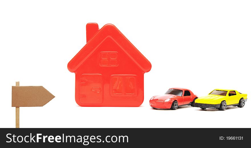A house and car toy isolated on white