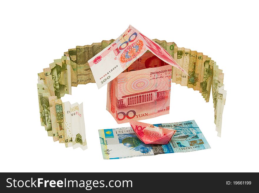 House and boat on the river of the Chinese and Kazakh money on an isolated white background. House and boat on the river of the Chinese and Kazakh money on an isolated white background