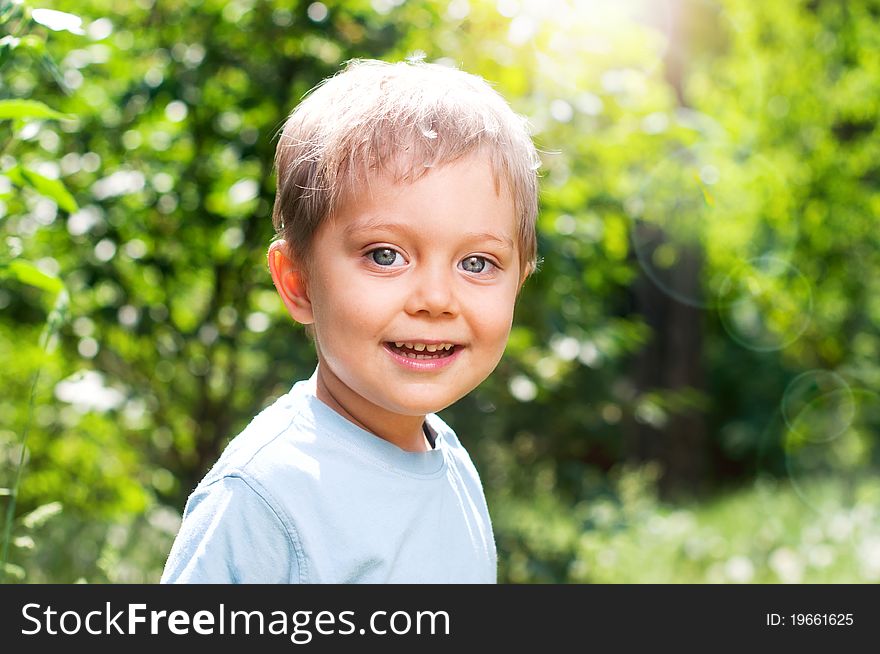 Cute 2 years old boy outdoors at sunny summer day. Cute 2 years old boy outdoors at sunny summer day