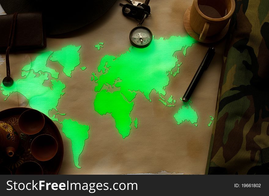 World map glows in the old paper