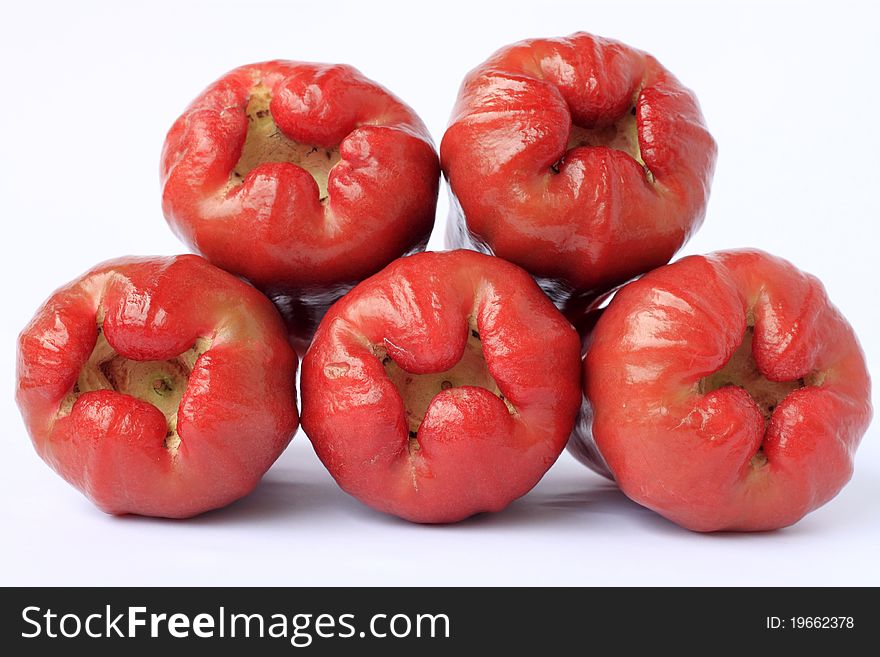 Five rose apple on white background