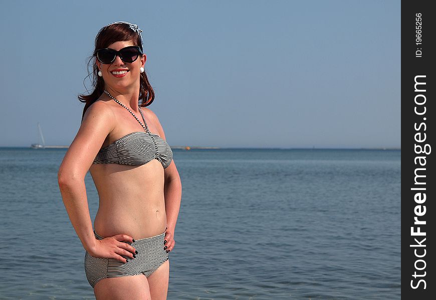 Retro girl having fun at the beach. Retro girl having fun at the beach