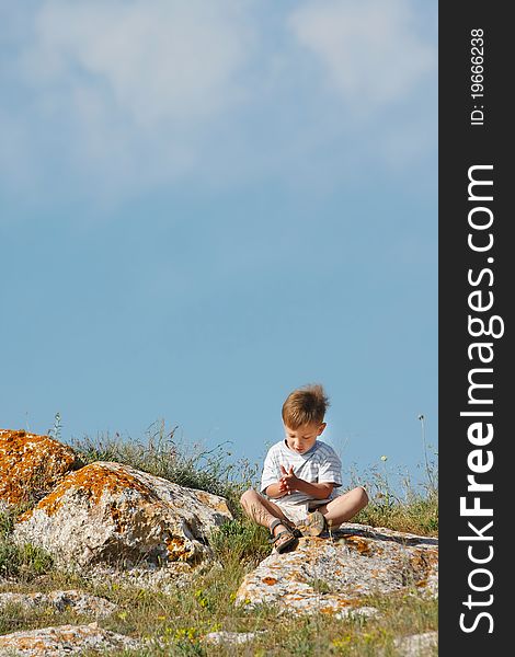 Boy On Natural Background