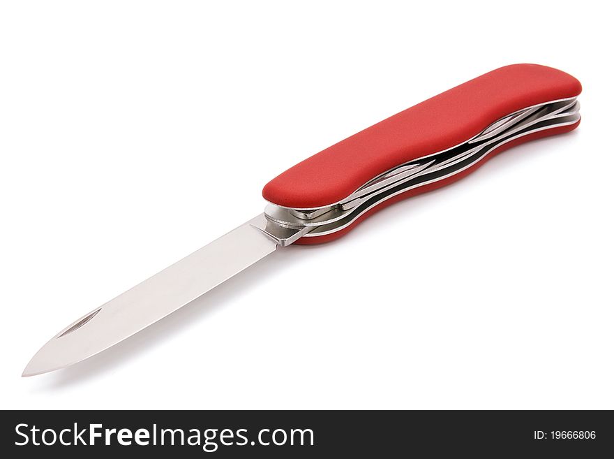 Red folding multi-functional knife on the white background. Red folding multi-functional knife on the white background.