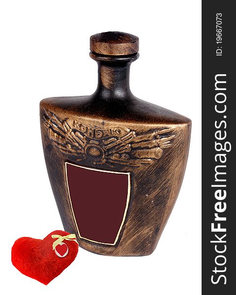 Cognac ceramic decanter with a sumbolical souvenir heath. Cognac ceramic decanter with a sumbolical souvenir heath.