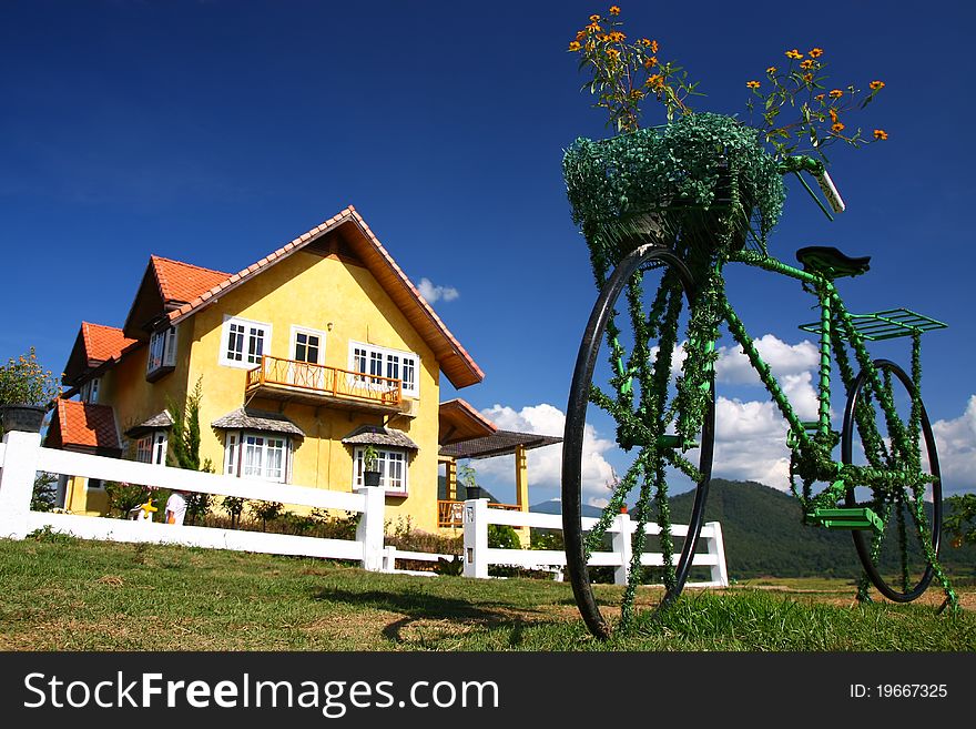 Bike is infront of house in countryside of Thailand. Bike is infront of house in countryside of Thailand