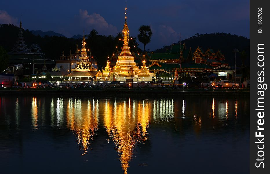 The pagoda reflect the water in the night, Maehongsorn, North of Thailand. The pagoda reflect the water in the night, Maehongsorn, North of Thailand