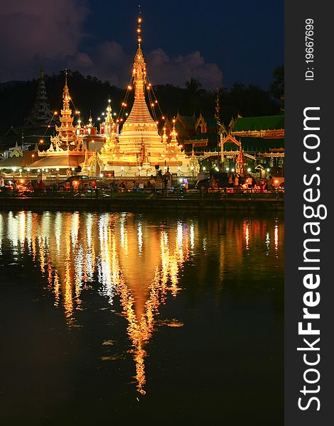 The pagoda reflect the water in the night, Maehongsorn, North of Thailand. The pagoda reflect the water in the night, Maehongsorn, North of Thailand