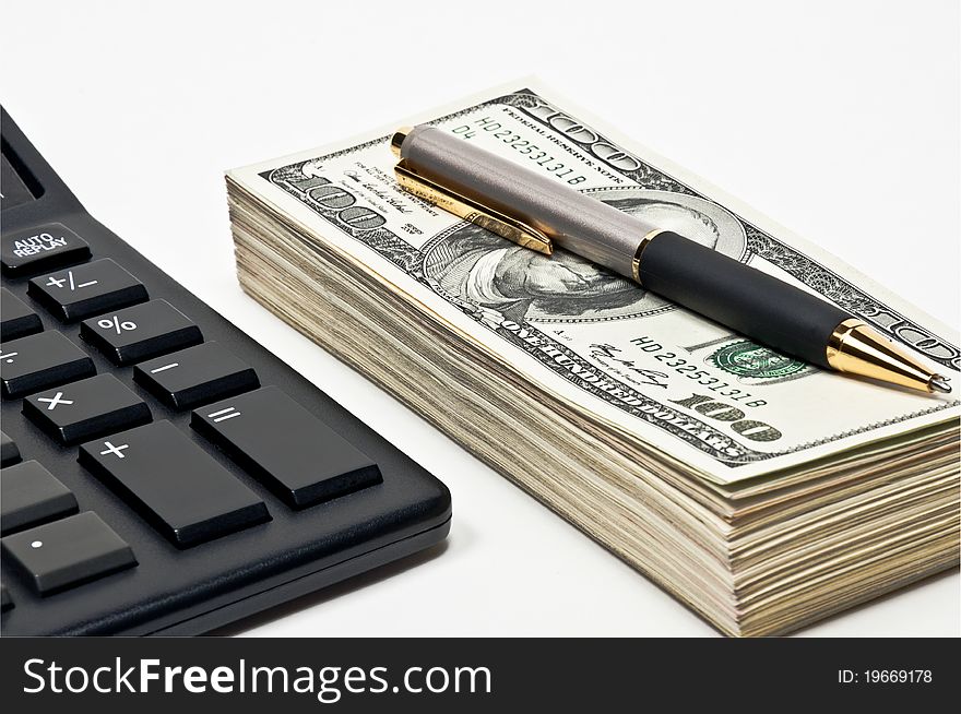 Business concept, bundle of money, pen and calculator. Business concept, bundle of money, pen and calculator.