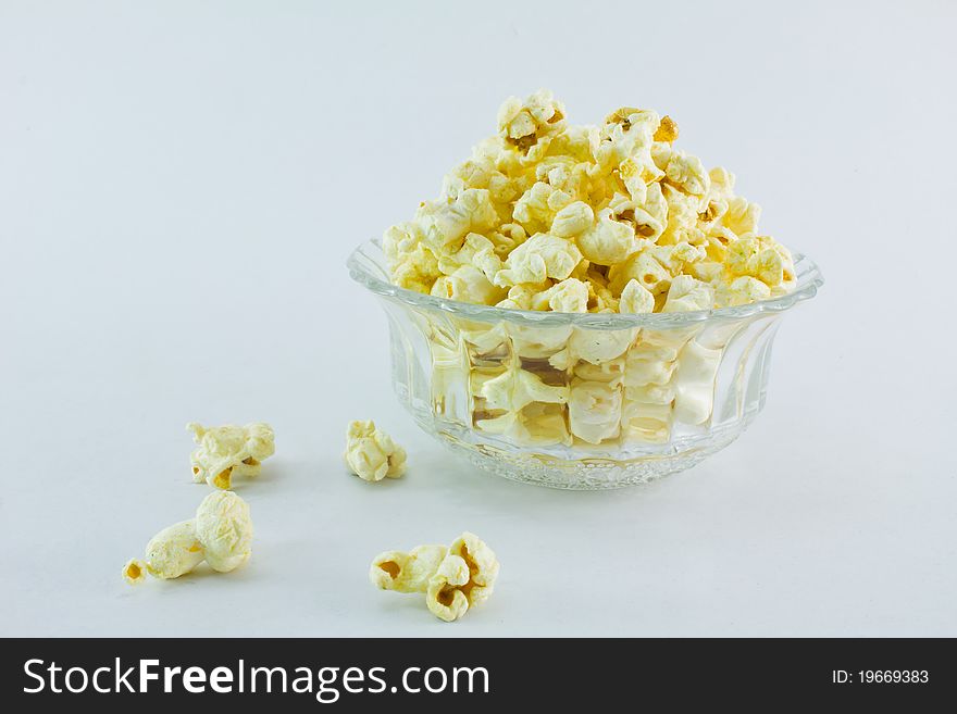 A bowl of popcorn isolated on white background